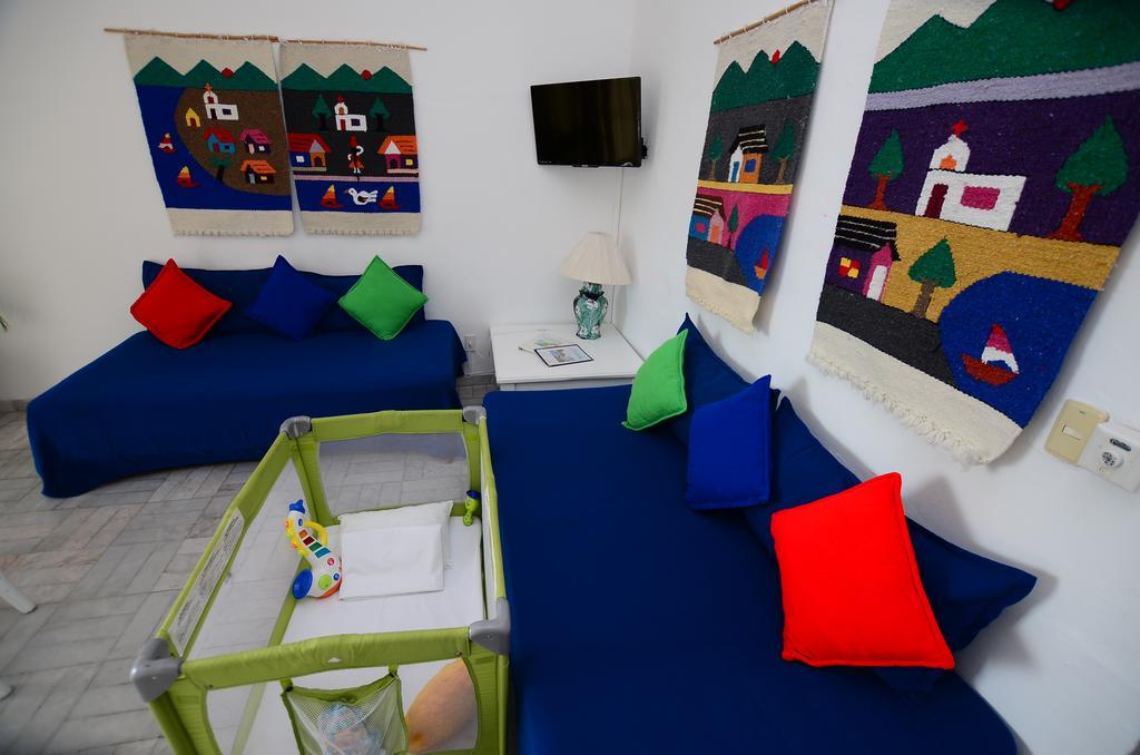 Dolphin Cove Inn Мансанильо Экстерьер фото